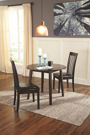  savor the beauty of this sleek drop leaf dining table. Dark and dramatic