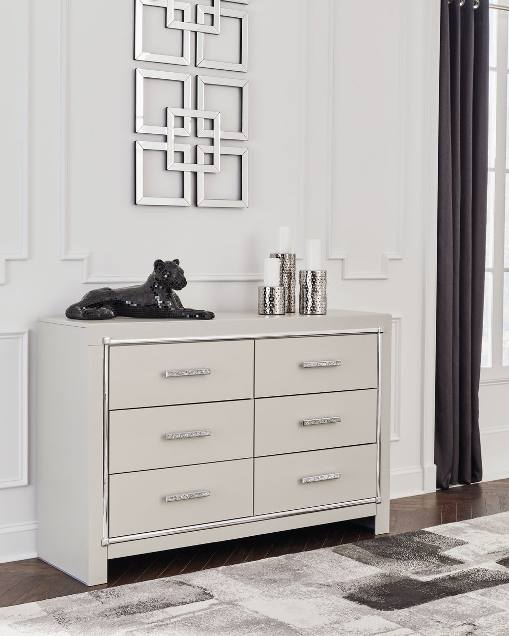 Bright, bold luxury. This dresser dazzles with its attention to detail. Your love of glamorous style is reflected in its all-over faux gator pattern in a metallic finish, exquisitely paired with faceted chrome-tone details. Complete with smooth-gliding st