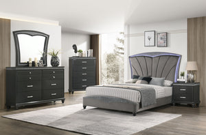 statement-making headboard with distinctive channel tufting and a shimmering border