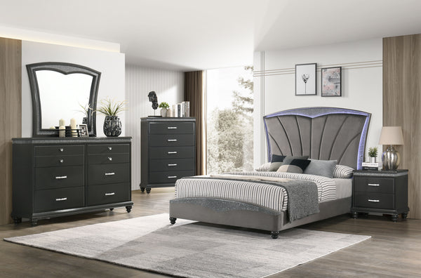  statement-making headboard with distinctive channel tufting and a shimmering border