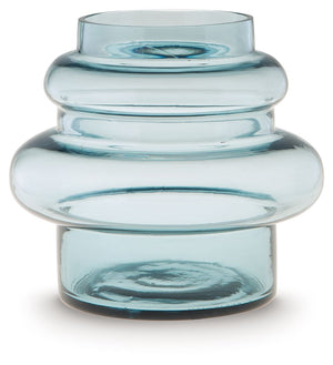 This contemporary vase is anything but ordinary. Displayed on its own or with faux greenery, the statement-making accentâ€”crafted from blown glass in a blue hueâ€”rounds out your modern decor beautifully.<br/><br/><b>Product Features</b><ul><li>Made with