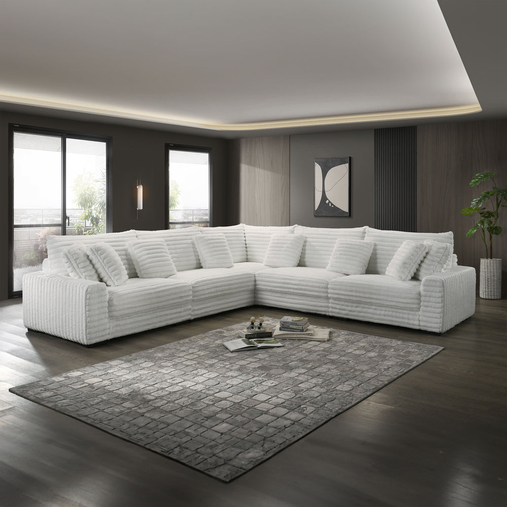 The Embrace 5-Piece Modular Sectional in white is an epitome of comfort and style, designed to cater to your lounging needs. It includes a right arm facing chair, a left arm facing chair, two armless chairs, a wedge, and eight accent pillows, all crafted 