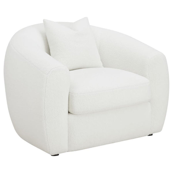Elevate your modern living room with this cheerful, contemporary natural lounge chair, upholstered in a white teddy boucle fabric across its elegantly curved silhouette and sloped armrests. A single accent pillow in a matching boucle rests against the ben