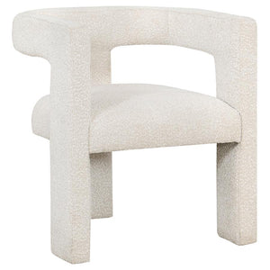 Enveloped entirely in the embrace of plush bouclÃ©, this chair redefines the art of relaxation with its all-fabric design. The seamless transition from the cushioned seat to the curved arms, all robed in the same soft fabric, creates a cocoon of comfort. 