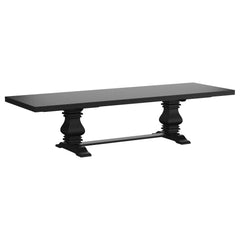This rectangular extension dining table blends classic European elegance with artisan craftsmanship. Crafted from solid pine, it features a double pedestal trestle base that exudes romantic charm and timeless character. The sculpted pedestals, connected b