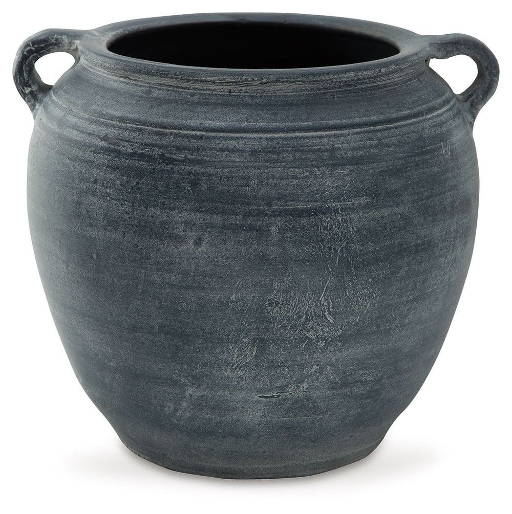 Understated in its beauty, this vase offers a traditional feel courtesy of its terra cotta construction. The antiqued look is brought into the present with a distressed blue hue. It-'s an effortless way to elevate a centerpiece, bookshelf or mantle. Add f