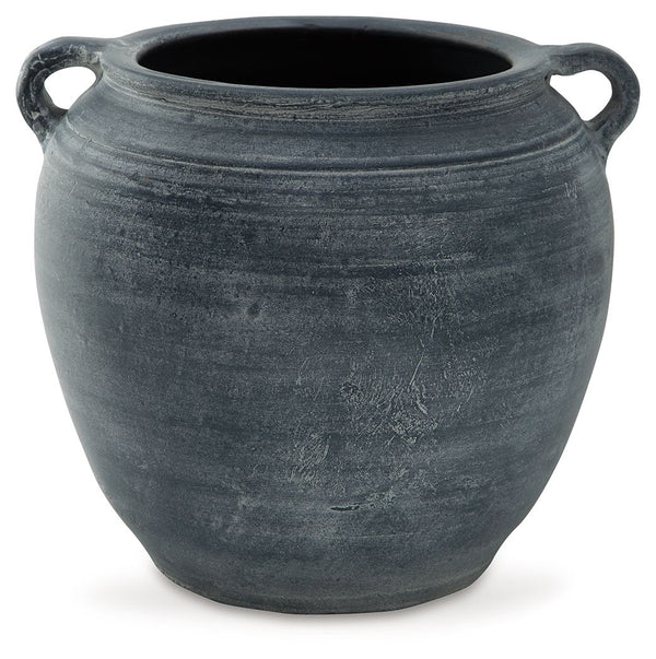 Understated in its beauty, this vase offers a traditional feel courtesy of its terra cotta construction. The antiqued look is brought into the present with a distressed blue hue. It-'s an effortless way to elevate a centerpiece, bookshelf or mantle. Add f