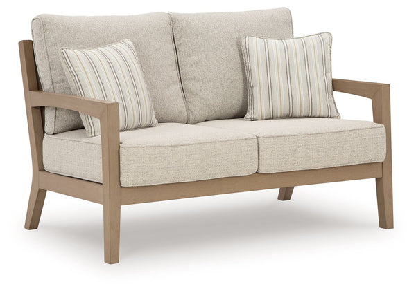 This loveseat is a beautiful addition to any outdoor living space. Effortless in its simplicity, this piece echoes your easygoing sensibilities. Combining durable, cutting-edge engineered materials, its Weatherwood construction enhances the contemporary d