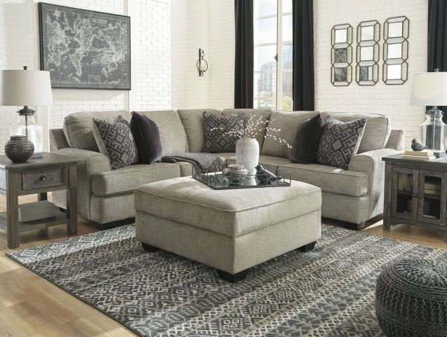 Whether your style is clean and contemporary or cozy modern farmhouse, this generously sized set in a stone-tone neutral upholstery has the corner on style. <h4><b>Bovarian - Stone - LAF Sofa w/Corner Wedge</b></h4> <table width=-"100%-"><colgroup><col st