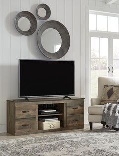 Entertain a rugged yet refined sense of style with this TV stand. Rustic finish and plank-style details pay homage to reclaimed barn wood, while faux metal banding with nailhead accents infuses a touch of industrial cool. Ultra clean lines ensure a look t