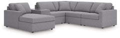 Looking cool and contemporary is great. But when it comes down to it, youâ€™re all about low-maintenance lounging. With the performance fabric on this sectional with console, cleaning spills is a breeze. Its customizable modular design caters to your ever