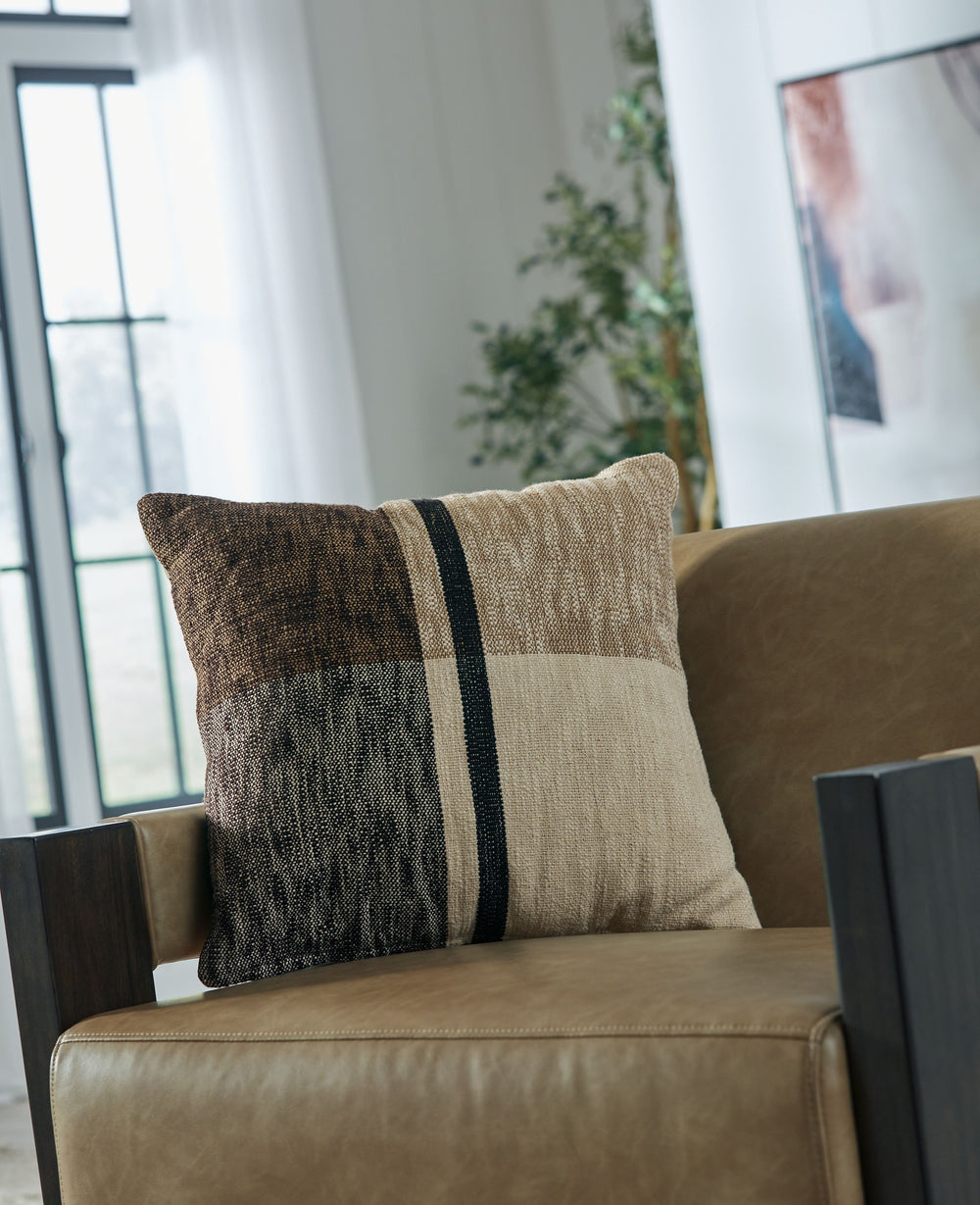 This accent pillow adapts the classic plaid pattern for modern tastes. Decidedly casual, its neutral colors come together in perfect harmony. Perch this pillow atop a sofa or bed for an on-trend pop of panache.<br/><br/><b>Product Features</b><ul><li>Made