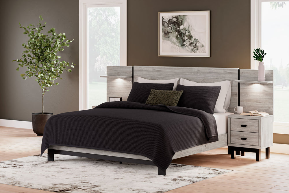 Craft a contemporary hideaway without breaking the bank. An elegant juxtaposition of refined neutral hues, this two-toned king panel bed with extensions brings sleek style to your space. The sheer simplicity of its profile stunningly frames your mattress,