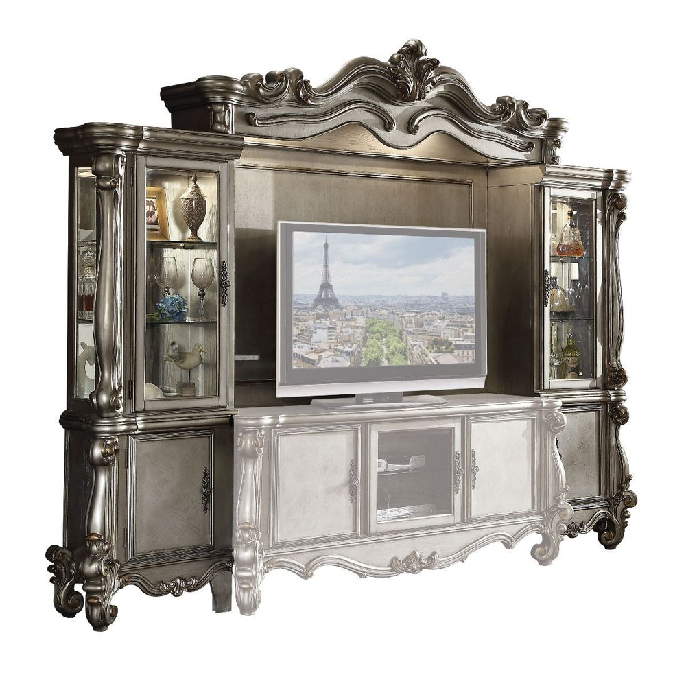 The Versailles the entertainment center was inspired by old European design. This collection features carved scrollwork accent on the bridge-'s crown. The collection pieces are carefully crafted with selected wood and veneers in antique platinum finish wi