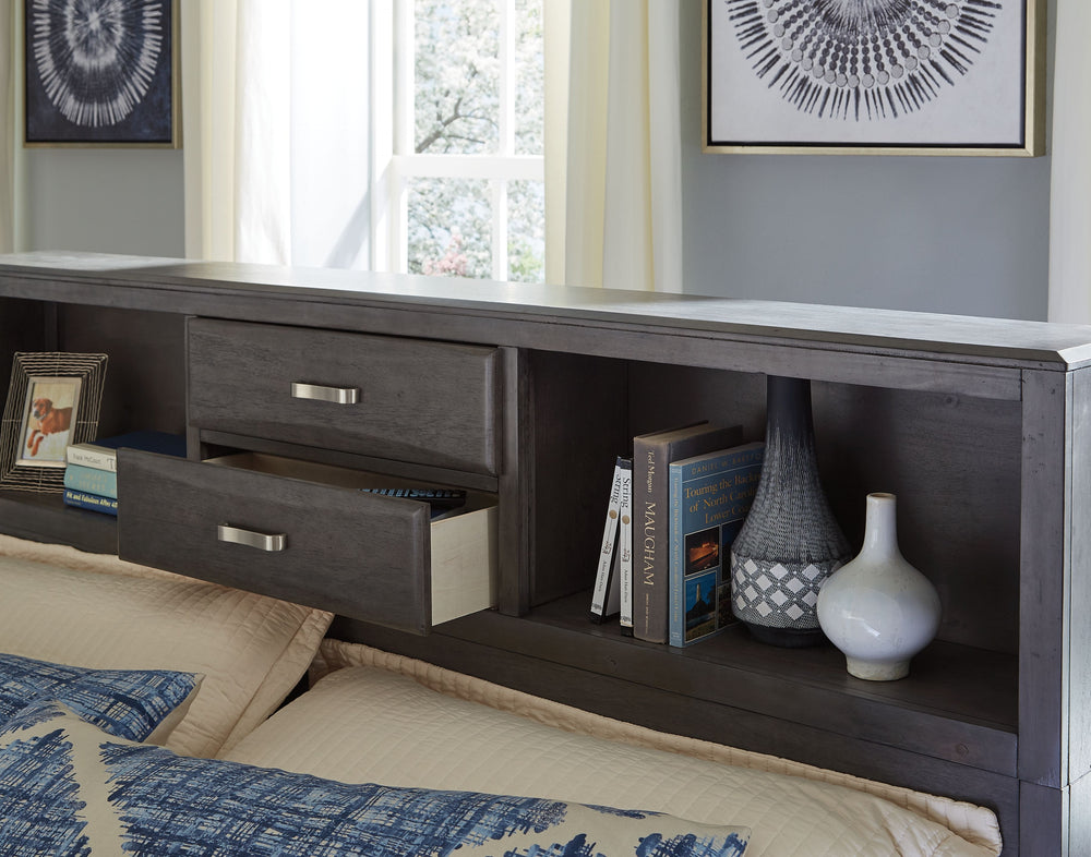 Contemporary style is shaping up beautifully. Designer elements are evident from every angle in this full storage bed. Quality crafted with dovetail construction, contoured drawers solve small space problems with ease. On one side of the bed a deep drawer