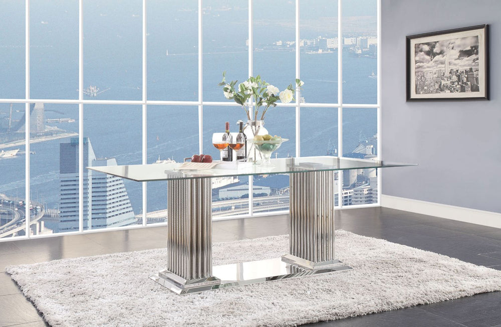 Add a modern touch to your dining room with the Cyrene dining room collection. With a pair of stunning mirrored pillars serving as the table-'s base, this beautiful rectangular pedestal table doubles as a piece of art for your dining room. Its spacious gl