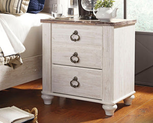 This nightstand is the ultimate statement piece for your coastal cottage or shabby chic inspired retreat. A whitewash finish on the drawers and sides is wonderfully easy on the eyes. Paired with the unique plank-effect top, itâ€™s a driftwoody look that h