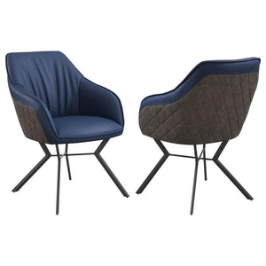 Upgrade your dining or accent seating with this retro-inspired armchair featuring a rich blend of textures and tones. The sleek blue leatherette front is paired with a brown suede-like back, giving it a high-contrast, designer look. Sloped arms and soft p