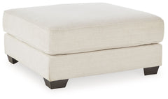 Delightfully modern. Exceptionally comfortable. If casually cool elegance is the look you-'re going for, this ottoman pleases in striking style. A plush top invites you to kick back and stay a while. Elevated in design, this companion piece is sure to be 