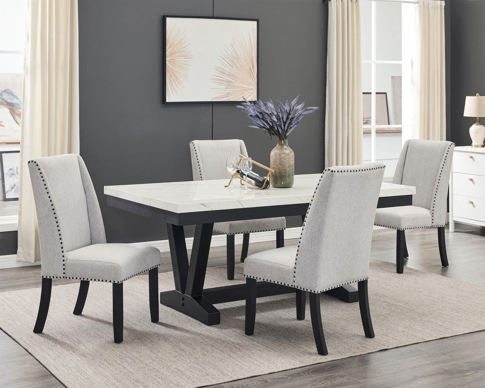 A fresh take on a traditional silhouette makes this group a great addition to your dining space. A genuine marble top is luxurious and timeless. The trestle base is updated in a contemporary charcoal finish. The upholstered dining chairs feature gently sl