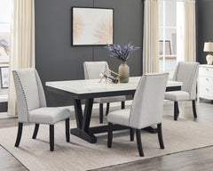 A fresh take on a traditional silhouette makes this group a great addition to your dining space. A genuine marble top is luxurious and timeless. The trestle base is updated in a contemporary charcoal finish. The upholstered dining chairs feature gently sl