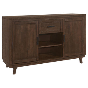 Enhance your dining area with our farmhouse and craftsman design dining server. Crafted from solid Asian hardwood, this server features a durable wire brushed brown oak finish, adding a rustic touch to your dÃ©cor. It offers functionality with its two doo