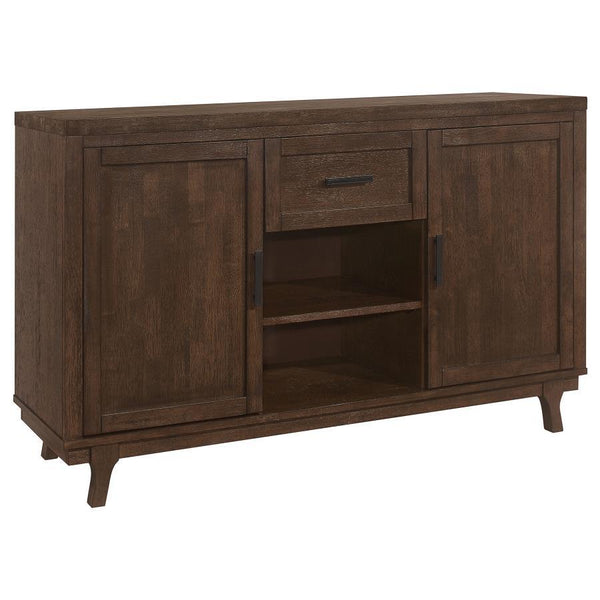 Enhance your dining area with our farmhouse and craftsman design dining server. Crafted from solid Asian hardwood, this server features a durable wire brushed brown oak finish, adding a rustic touch to your dÃ©cor. It offers functionality with its two doo
