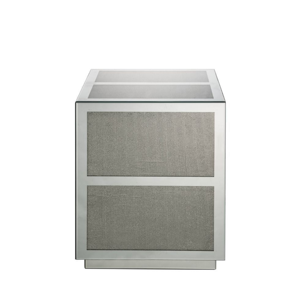 Make your family photos and cherished items the center of attention on this Lavina occasional table. With beautifully crafted beveled mirrors and brilliant faux diamonds, this table screams glamour. The beveled mirrored trim reflects light and enhances th