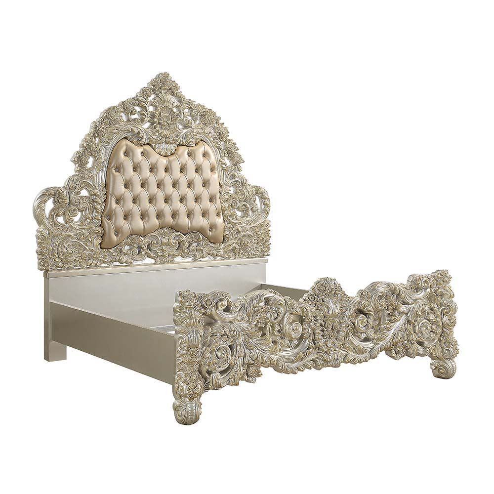 A bed fit for royalty, the Sorina bed brings glam and style to any bedroom in your home. Crafted exquisitely with a tall regal headboard that is accented with button tufts along the center of the headboard. The footboard features the same majestic scrollw