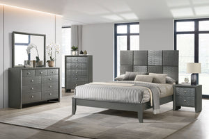 This bedroom collection is the embodiment of sleek, contemporary design, characterized by its rich gunmetal finish and distinctive textured front panels. The centerpiece, a chic bed with a statement headboard, features geometric paneling that adds depth a