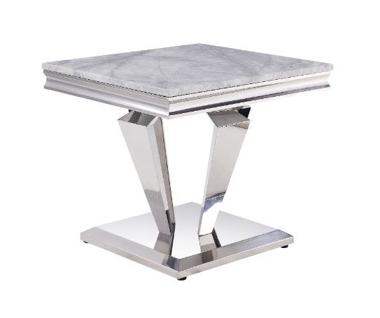 Contemporary flair breathes new life and interest into traditional design. The perfect combination of beauty and style features classic pedestal base topped with light grey marble. Updated modern touches are seen throughout the table base such as sleek, u
