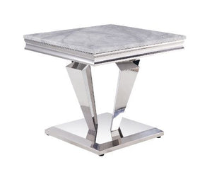 Contemporary flair breathes new life and interest into traditional design. The perfect combination of beauty and style features classic pedestal base topped with light grey marble. Updated modern touches are seen throughout the table base such as sleek, u