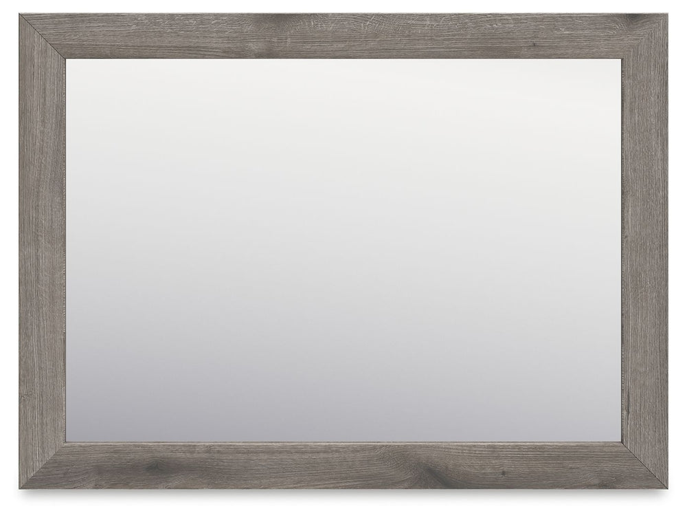 Combining a casual aesthetic with functional flair, this bedroom mirror suits styles from rustic to industrial. In a chic weathered gray hue, it brings a charmingly curated vibe to your morning and nighttime routines. Stage it as you pleaseâ€”this mirror 