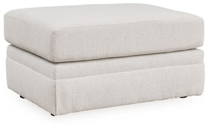 Clean lines and a streamlined silhouette define the architectural attitude of this ottoman. It-'s an ideal way to enhance your lounge space when paired with seating arrangements. A highly resilient cushion with textured upholstery beckons you to kick up y