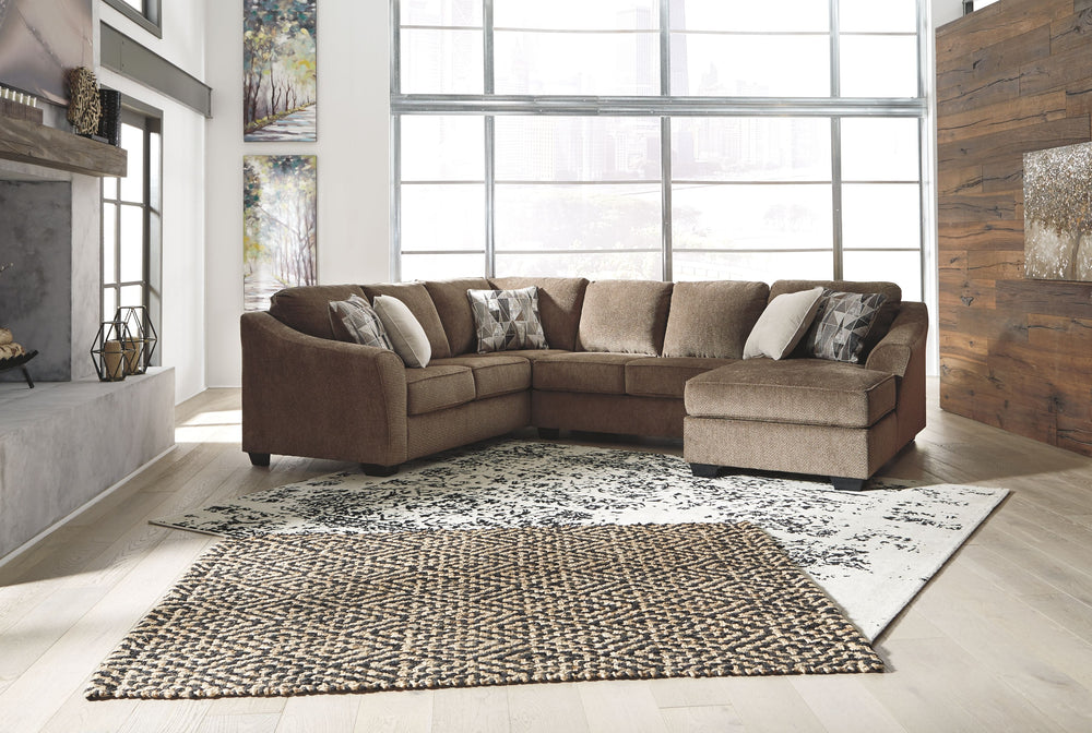 Looking to serve it up family style? Sporting clean, contemporary lines and a highly textural upholstery for a warm, cozy feel, this sectional delights with its city chic aesthetic and earthy appeal. Taking neutral to a new level, the heavy textured cheni