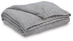 Comfort meets casually chic style in this throw blanket. Its neutral hue and knitted construction create trendy textural variation when draped over a sofa or the foot of a bed. And it goes beyond style, with the soft chenille fabric acting as a cozy compa