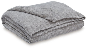 Comfort meets casually chic style in this throw blanket. Its neutral hue and knitted construction create trendy textural variation when draped over a sofa or the foot of a bed. And it goes beyond style, with the soft chenille fabric acting as a cozy compa