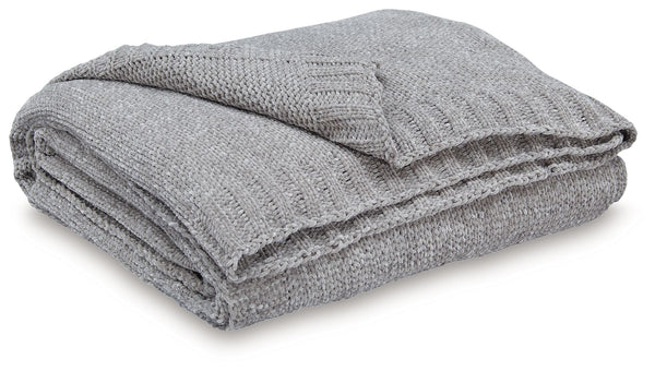 Comfort meets casually chic style in this throw blanket. Its neutral hue and knitted construction create trendy textural variation when draped over a sofa or the foot of a bed. And it goes beyond style, with the soft chenille fabric acting as a cozy compa