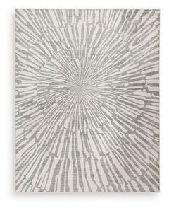 This rug takes traditional design motifs and brings them into the present. Outfitted with deliciously soft faux fur and a chic sunburst design in shades of gray and white, it-'s an apt addition to contemporary interiors. Further suiting your modern lifest