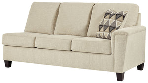 This right-arm facing sofa with corner wedge is made with polyester upholstery. Pairs with other items in the series to make a sectional.<br><br><b>Additional Dimensions</b><br><ul><li>Arm height: 27-"</li><li>Leg height: 4.5-"</li><li>Minimum width of do