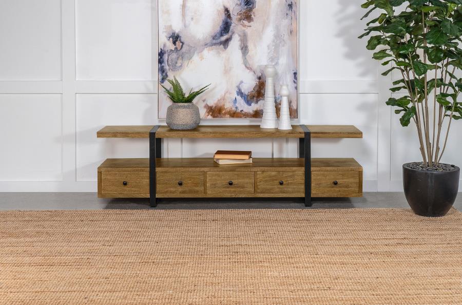 Elevate your entertainment space with this masterfully designed TV stand, perfectly suited for televisions up to 75". Constructed from robust Mango wood and accentuated with metal, it features a distinctive floating shelf, supported by sleek gunmetal-fini