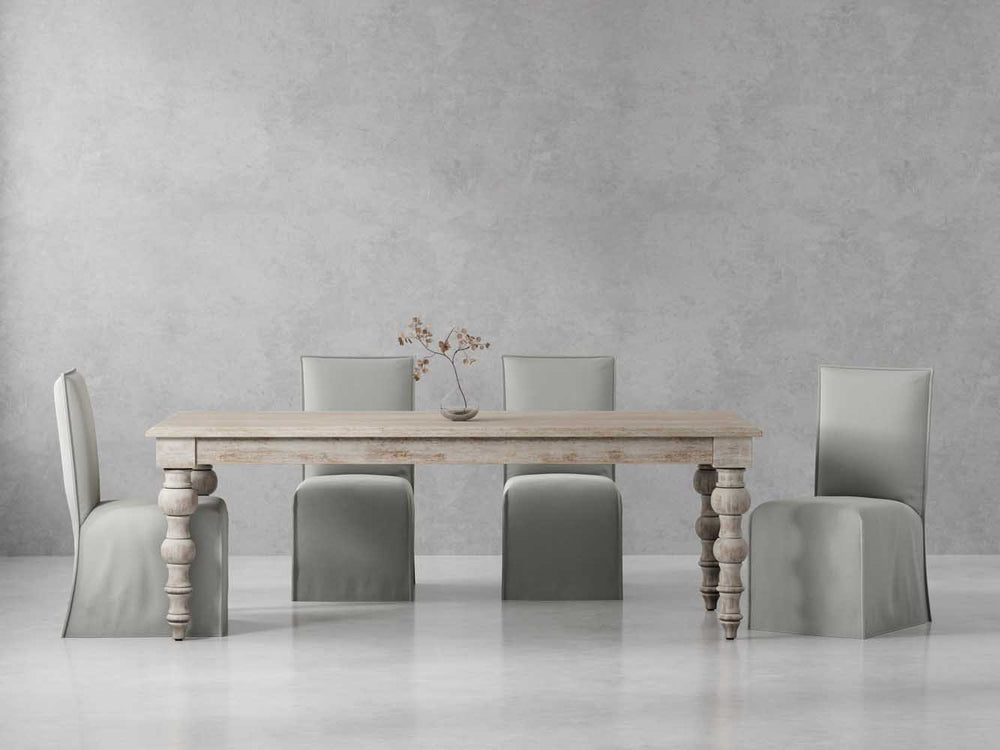 Crafted from solid mango, this table boasts a unique aesthetic with natural variations of color, wood grain, and knots, making each piece one-of-a-kind. Generously proportioned, this table can comfortably seat up to eight guests, making it the perfect cen