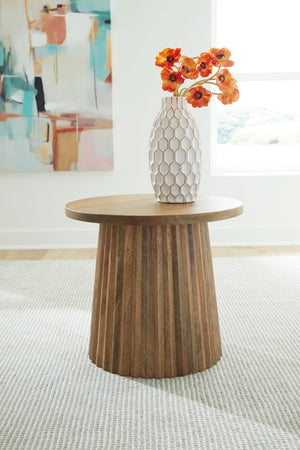  the solid wood piece wows with a fluted base. This organic beauty can be used on its own or grouped with other pieces in the collection. Howâ€