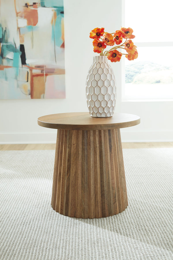  the solid wood piece wows with a fluted base. This organic beauty can be used on its own or grouped with other pieces in the collection. Howâ€