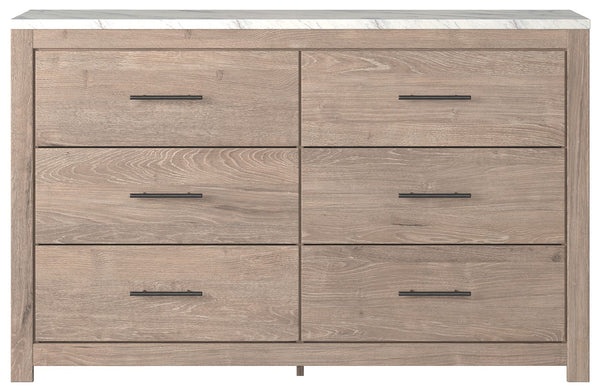  clean and casually modern. This dresserâ€™s light natural finish and faux Calcutta marble top set the tone for your calming sanctuary. Large linear pulls add dimension and authenticity. Six smooth-gliding drawers neatly accommodate your wardrobe nee