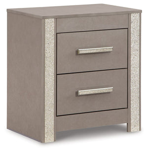 Love sleek and bold contemporary style? Drink in the beauty of this nightstand. Its eye-catching details include glam glitter accents and the look of leather grain with a subtle gray finish. Large-scale linear handles, in a sophisticated champagne chrome 