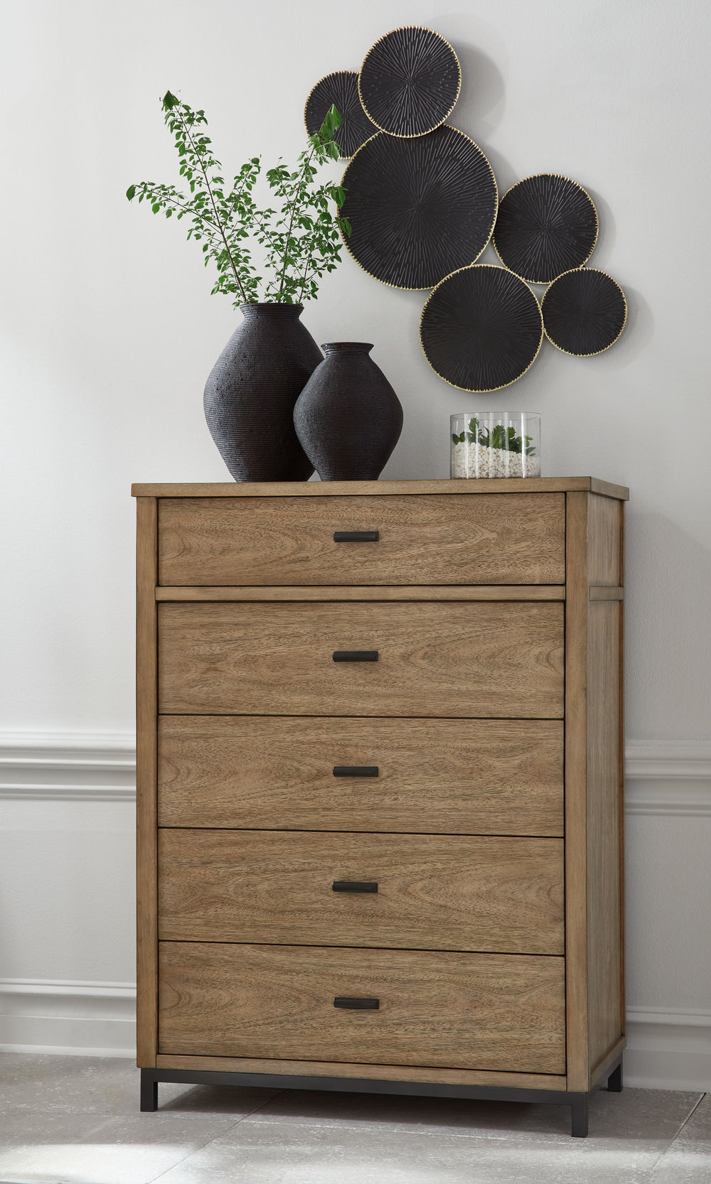 Sleek in its simplicity, this chest of drawers takes a relaxed approach to refinement. Its mixed-material design brings a trendy urban-chic feel to your morning and nighttime routines, while functional features keep your bedroom clutter-free. Clothes and 