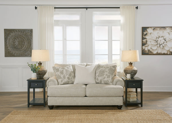  easygoing hue is enhanced by even lighter flax peeking through. Distinctive roll arms add a dab of debonair