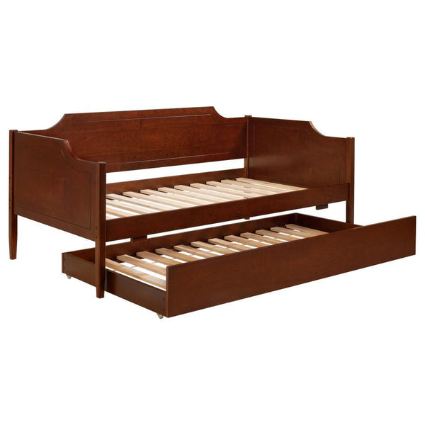 This modern classic-style daybed with trundle merges timeless elegance with practical design. The camelback silhouette and refined panel detailing add sophistication, while its construction from Asian hardwood, plywood, MDF, and cherry veneer ensures dura