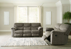 Sincere in its styling, this reclining sofa and loveseat invites a relaxed sensibility into your space. Its neutral upholstery has a universal appeal, with pull-tab reclining making it easy to kick back in comfort. Providing high-quality functionality at 
